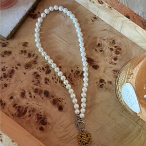 Elegant Pearl Necklace with Gold Charm